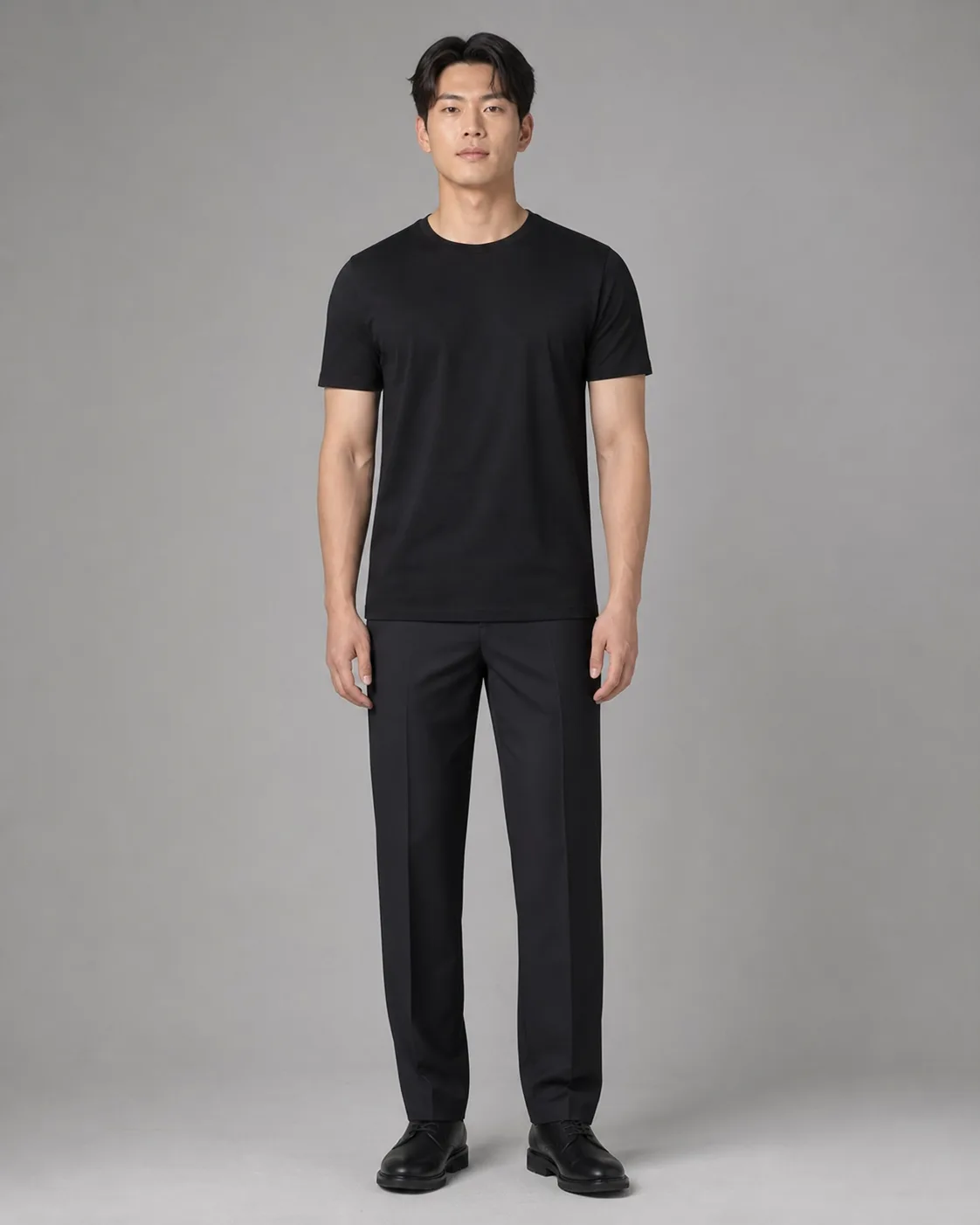 A model in a plain black outfit before virtual try-on